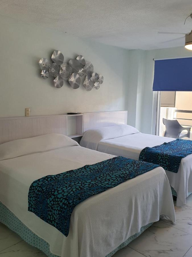 Marlin Turquesa Departamentos Frente Al Mar Apartment Cancun Luaran gambar